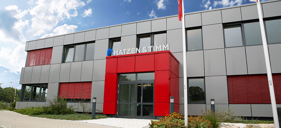 The side entrance of the Matzen and Timm with administration building. 